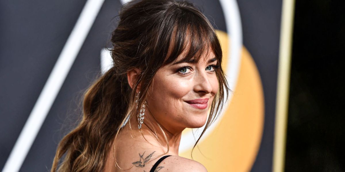 Dakota Johnson Glows in Elegant Green Gown on Governors Awards Red Carpet