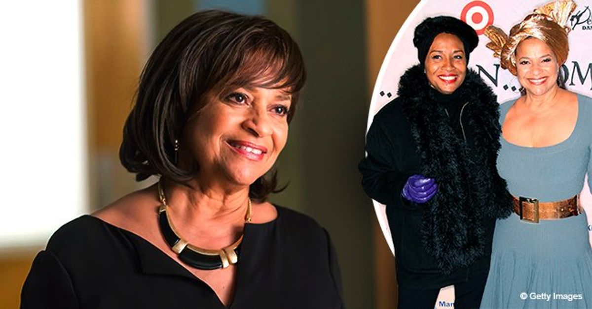 Debbie Allen Stuns Wearing a Belted Light Blue Dress & Gold Turban in a