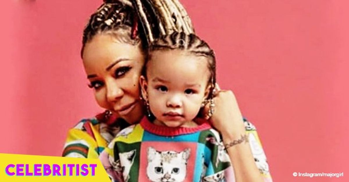 Tiny Harris flaunts curves in matching bathing suit with Baby Heiress ...