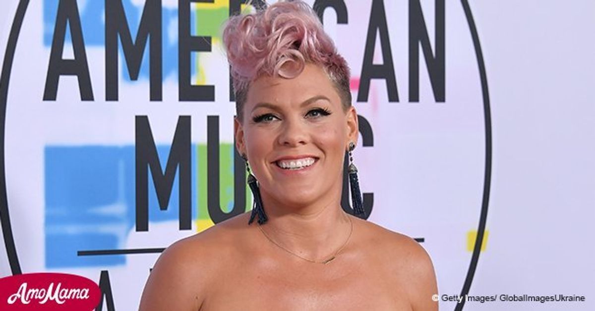 Pink shows off gorgeous cleavage in zip up black jumpsuit during recent ...