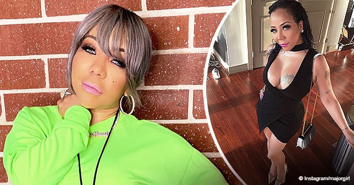 Tiny Harris Turns Heads in a Tight Mini Dress with Deep Cleavage