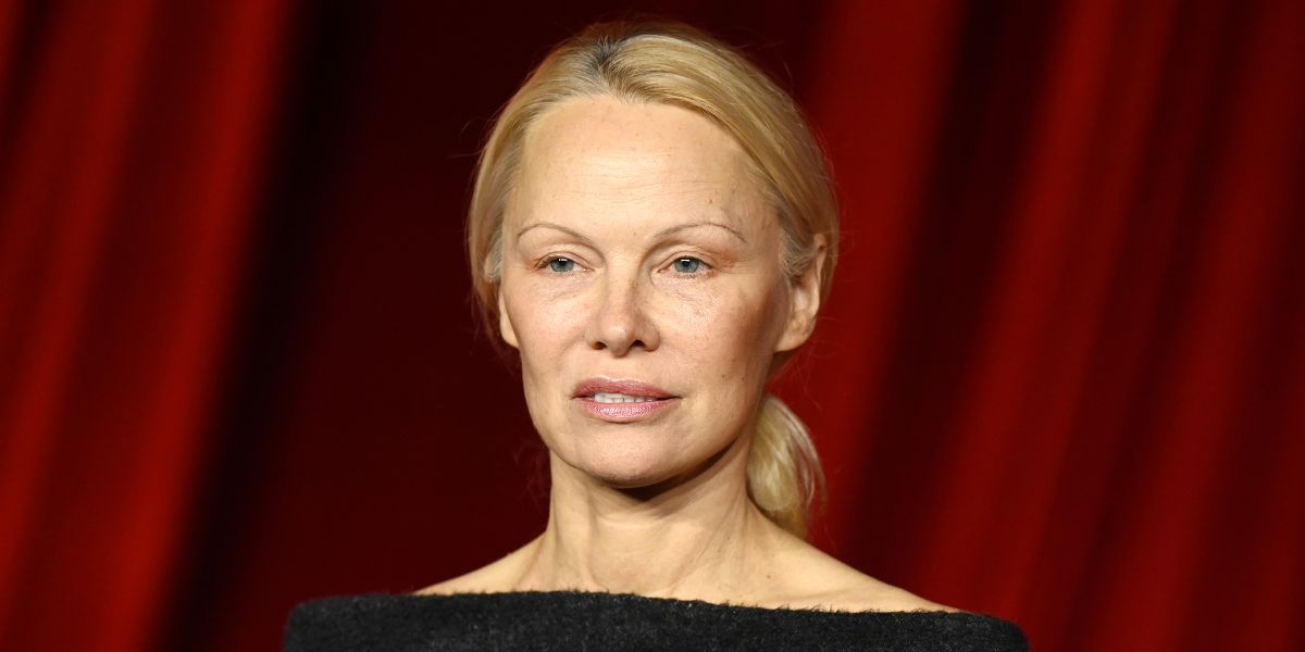 Pamela Anderson, 57, Dazzles in SilverSequined Dress & 'Baby Bangs' at