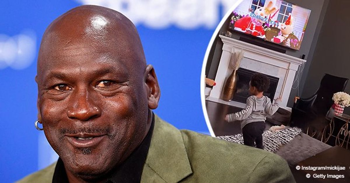 Michael Jordan's Grandson Looks Mischievous in New Post Running across a Room in a Gray Outfit