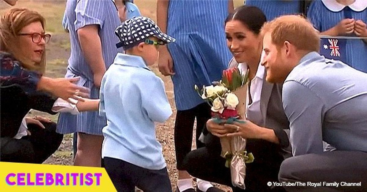 Little boy gets hugs from the royal family after stroking Prince Harry ...