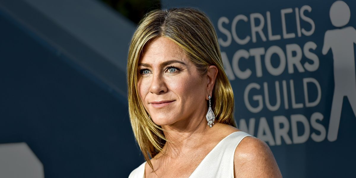 Jennifer Aniston Walks the Red Carpet With Boyfriend Jim Curtis for the First Time