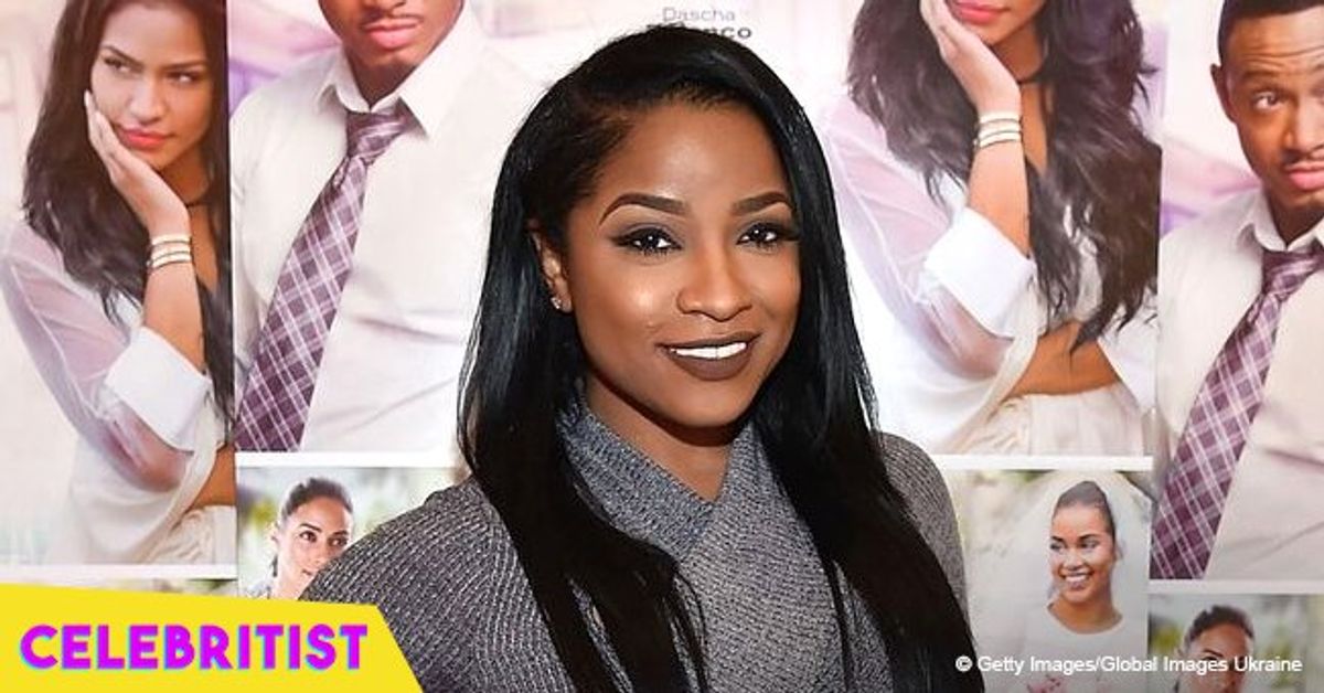 Toya Wright Redefines Edgance with the Black Plunging Midi Dr.