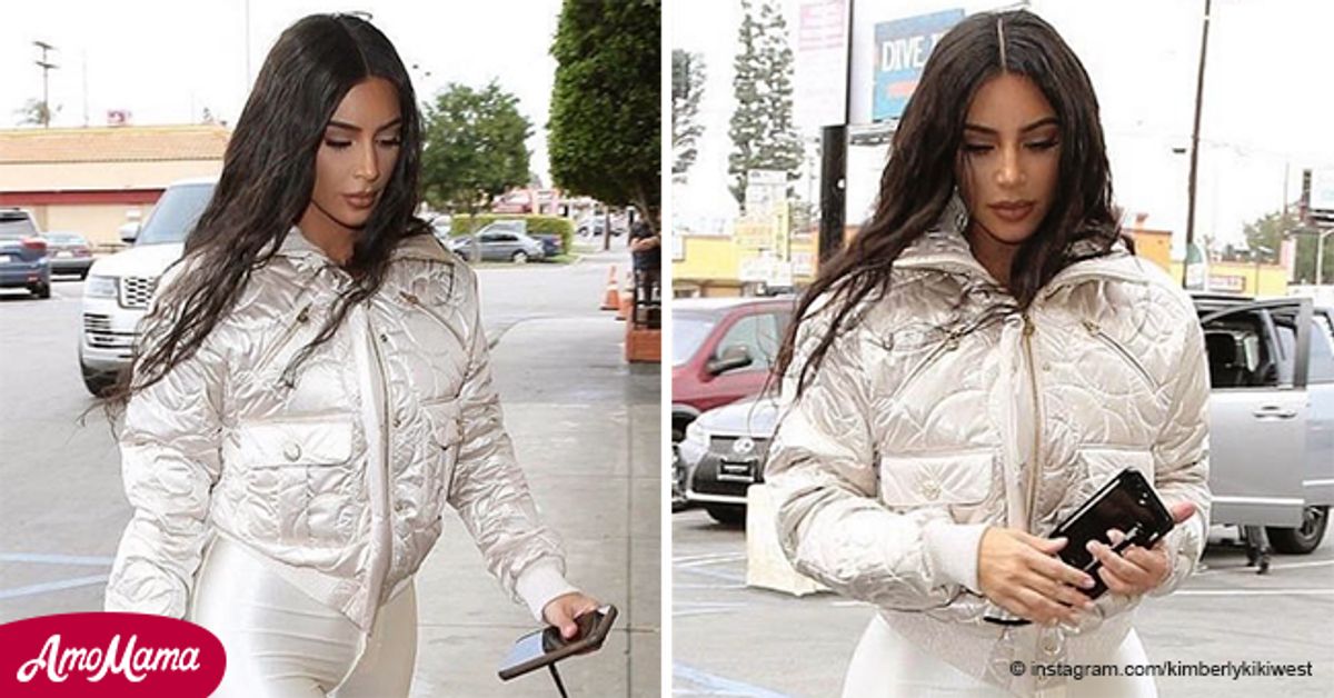 Kim Kardashian Dons Eye-Popping Shiny White Leggings and Puffer Jacket  While in Calabasas