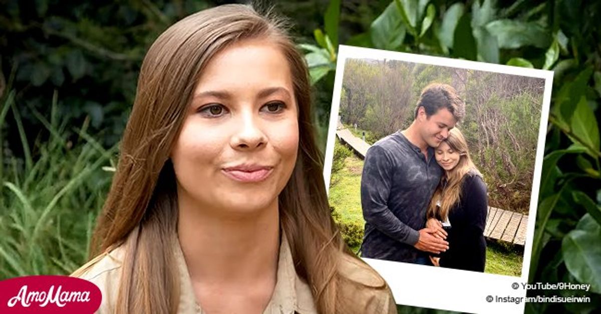 Bindi Irwin & Her Husband Chandler Powell Cradle Her Growing Baby Bump