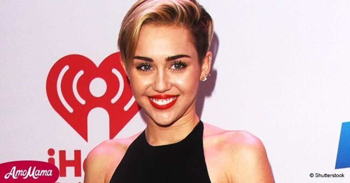 Miley Cyrus parades her figure in Calvin Klein sports bra while having(00)
