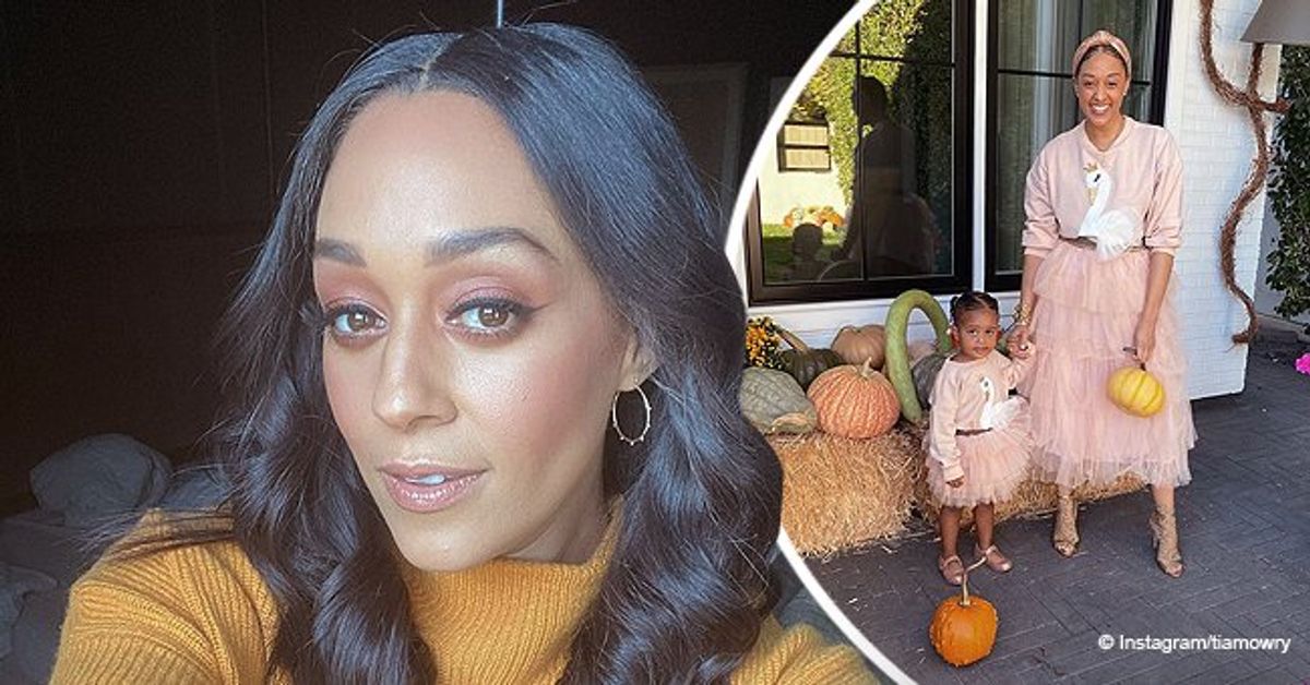 Tia Mowry & Daughter Cairo Look Cute Posing with Halloween Decorations(02)