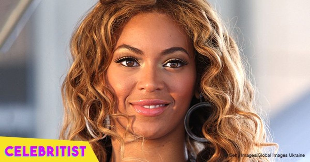 Beyoncé bares cleavage in plunging gray suit & tan checked coat in ...