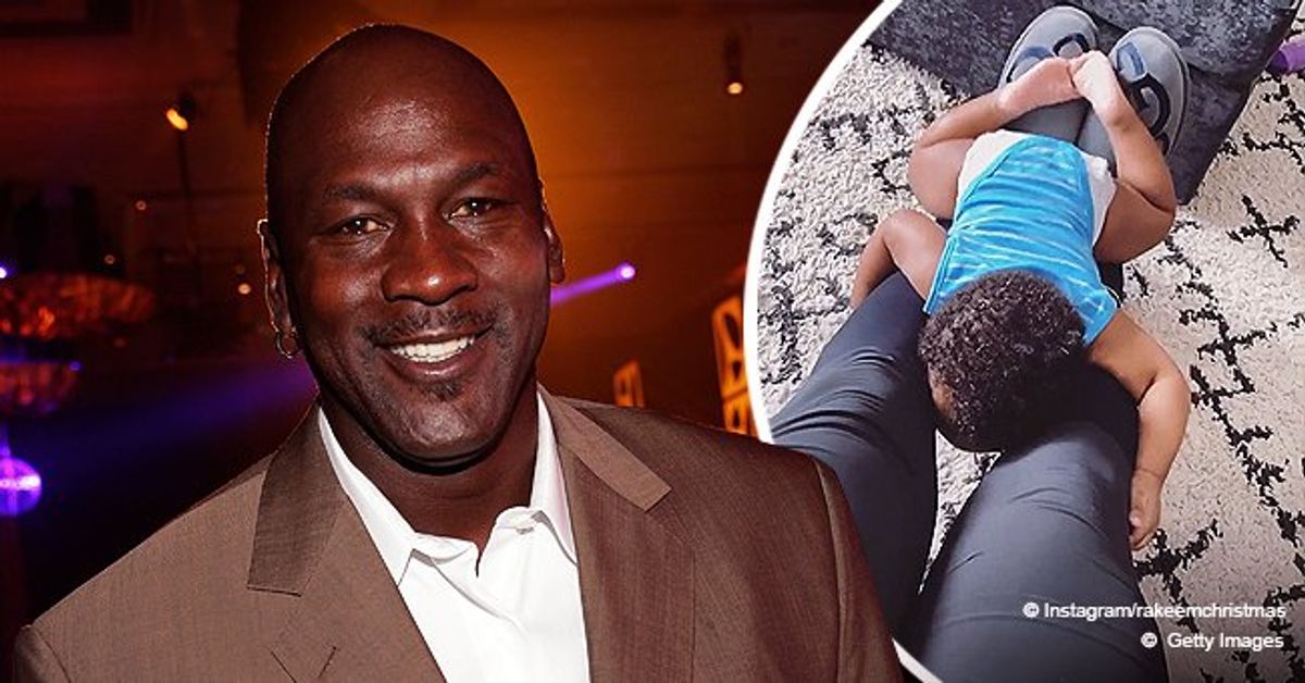 Michael Jordan's Grandson Rakeem Enjoys Swinging on His Father's Legs in a Video
