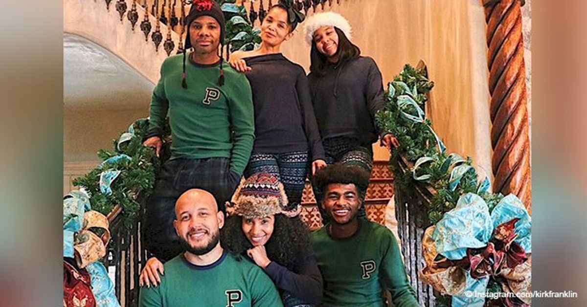 Kirk Franklin poses with his wife & grown kids in matching pajamas for